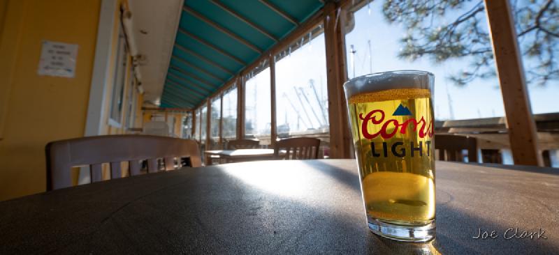 Outdoor deck seating and cold beer